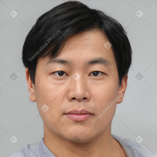 Neutral asian young-adult male with short  black hair and brown eyes