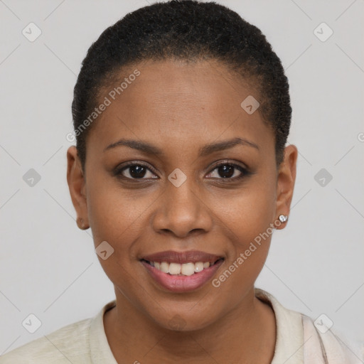 Joyful black young-adult female with short  brown hair and brown eyes