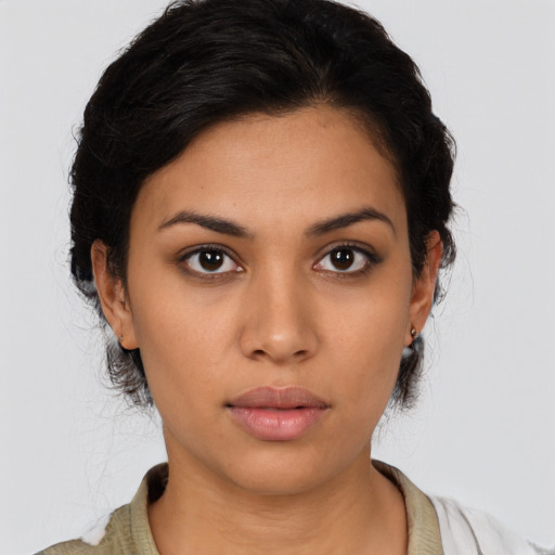 Neutral latino young-adult female with medium  brown hair and brown eyes