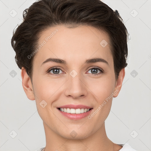 Joyful white young-adult female with short  brown hair and brown eyes