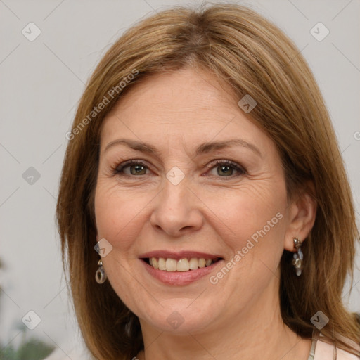 Joyful white adult female with medium  brown hair and green eyes