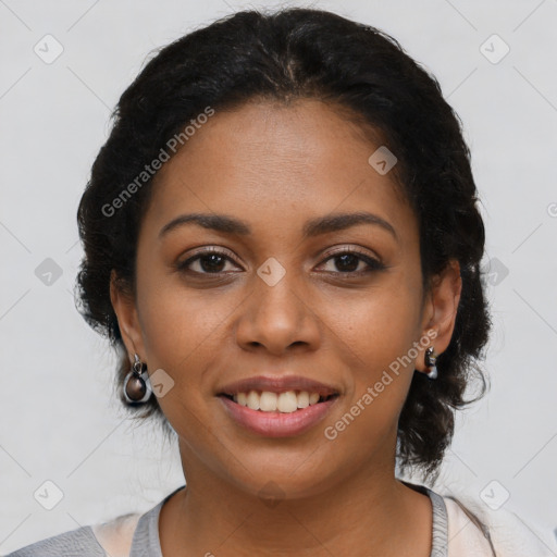 Joyful latino young-adult female with short  black hair and brown eyes