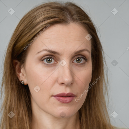 Neutral white young-adult female with long  brown hair and brown eyes