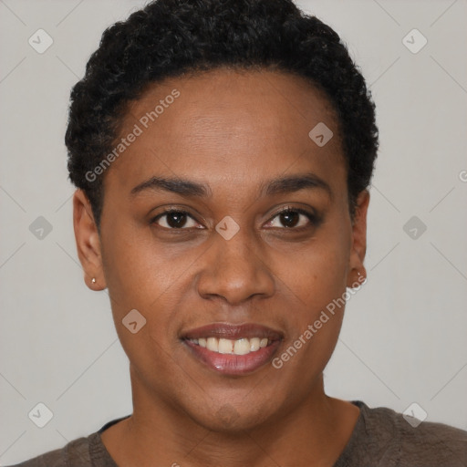 Joyful black young-adult female with short  brown hair and brown eyes