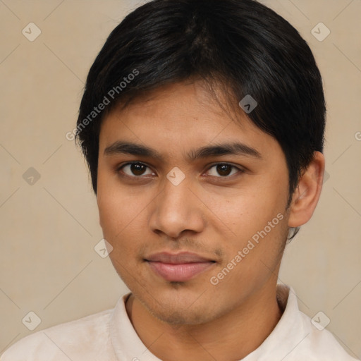 Joyful latino young-adult male with short  brown hair and brown eyes