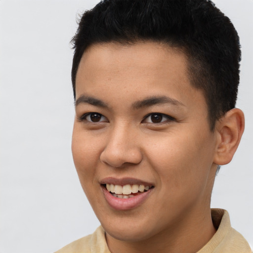 Joyful latino young-adult male with short  brown hair and brown eyes