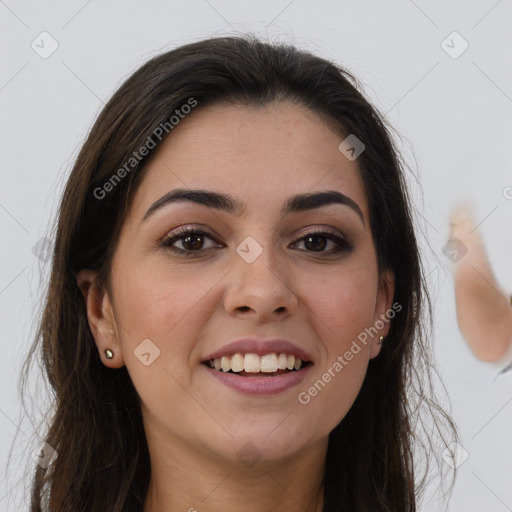 Joyful white young-adult female with long  brown hair and brown eyes