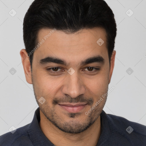 Joyful white young-adult male with short  brown hair and brown eyes