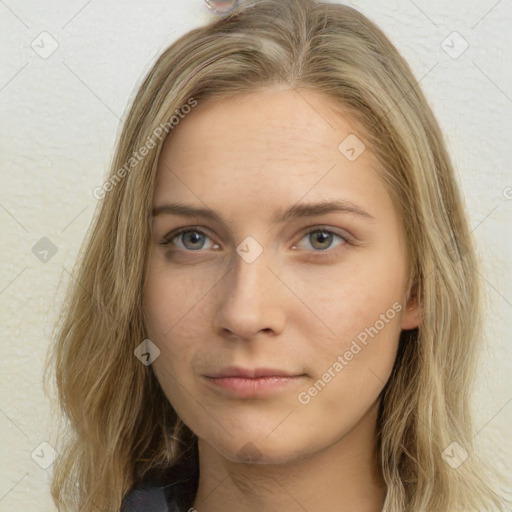 Neutral white young-adult female with long  brown hair and brown eyes