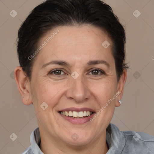 Joyful white adult female with short  brown hair and brown eyes