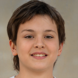 Joyful white child female with short  brown hair and brown eyes