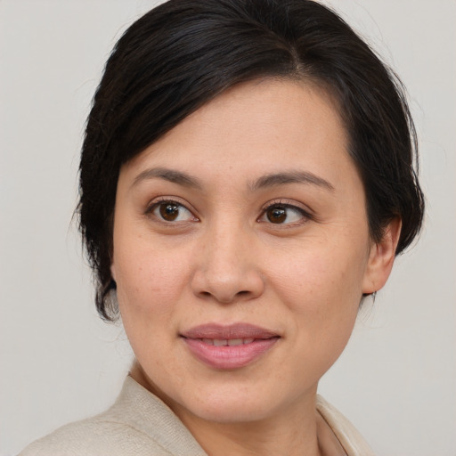 Joyful white young-adult female with medium  brown hair and brown eyes