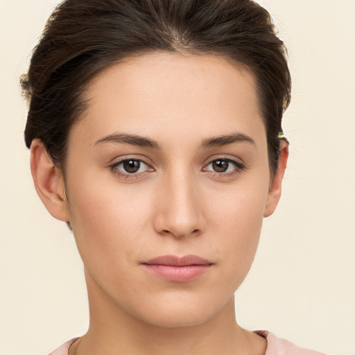 Neutral white young-adult female with short  brown hair and brown eyes