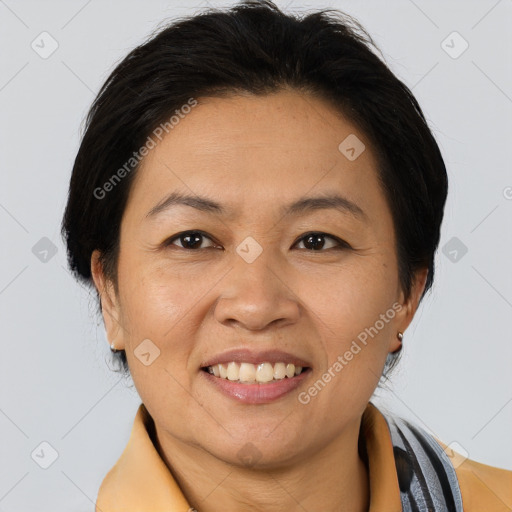 Joyful white adult female with medium  brown hair and brown eyes