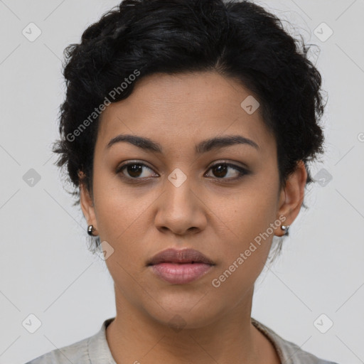 Joyful latino young-adult female with short  black hair and brown eyes