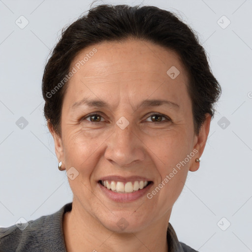 Joyful white adult female with short  brown hair and brown eyes