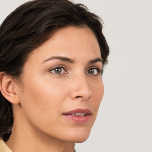 Neutral white young-adult female with short  brown hair and brown eyes