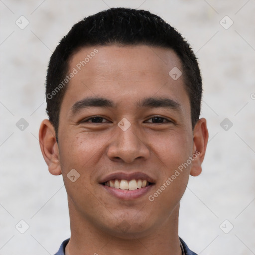 Joyful white young-adult male with short  black hair and brown eyes