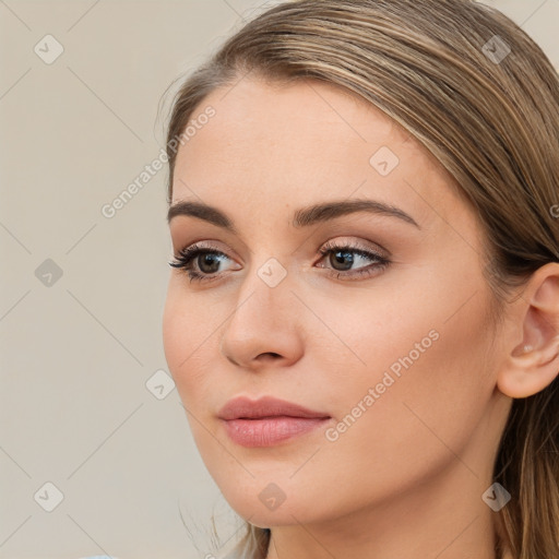 Neutral white young-adult female with long  brown hair and brown eyes