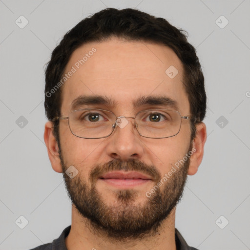 Joyful white adult male with short  brown hair and brown eyes