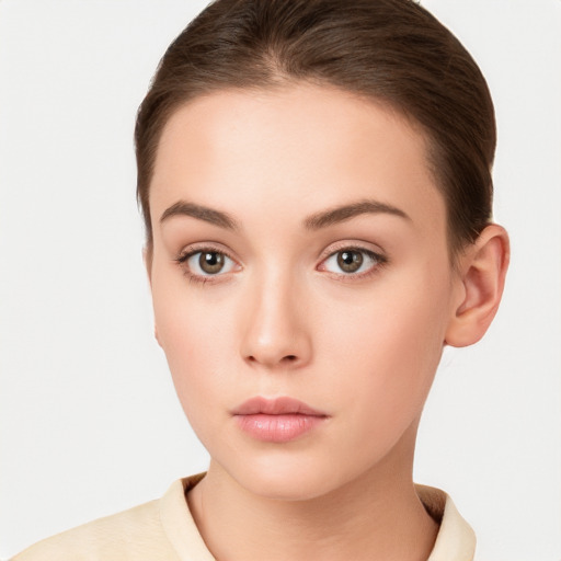 Neutral white young-adult female with short  brown hair and brown eyes