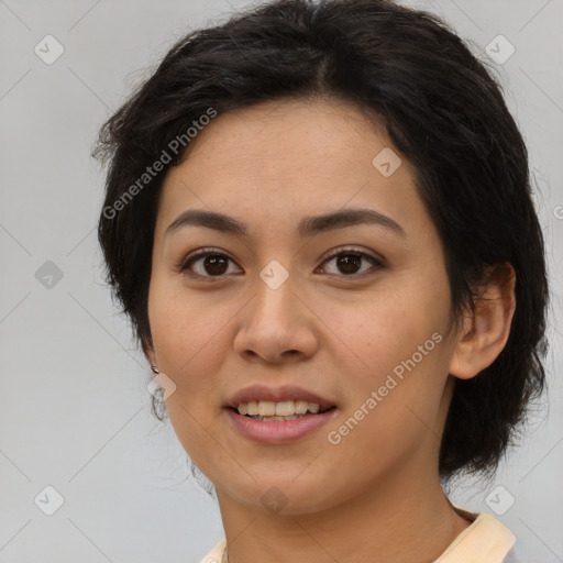 Joyful latino young-adult female with medium  brown hair and brown eyes