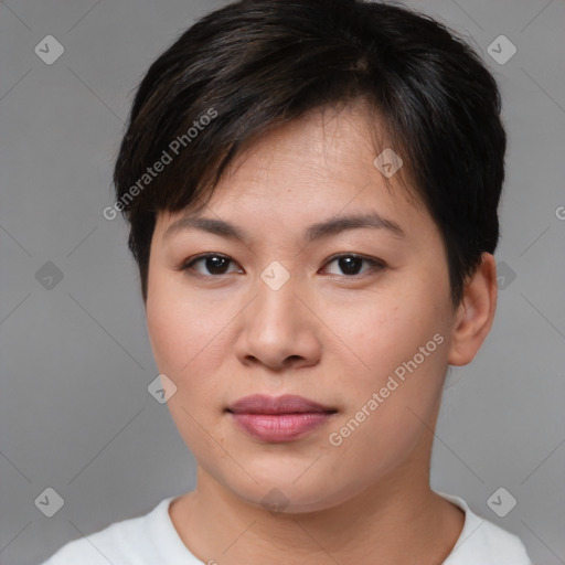 Joyful asian young-adult female with short  brown hair and brown eyes