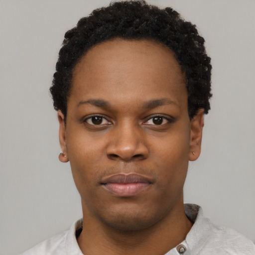 Neutral black young-adult female with short  black hair and brown eyes