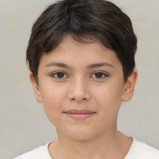 Joyful white child female with short  brown hair and brown eyes