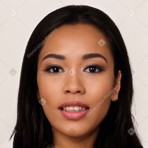 Joyful latino young-adult female with long  black hair and brown eyes