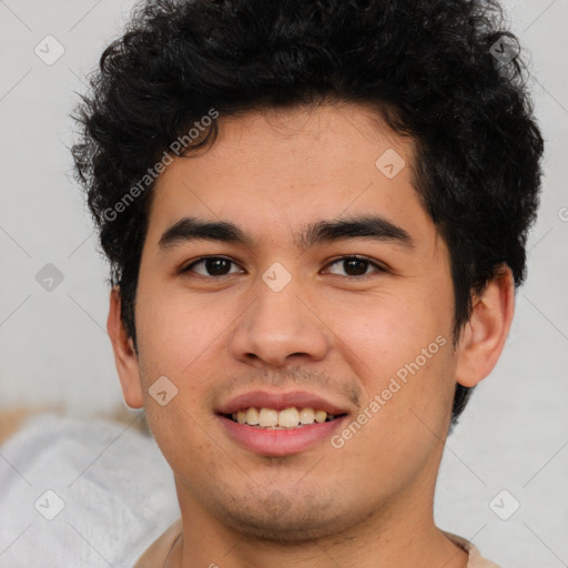 Joyful latino young-adult male with short  brown hair and brown eyes