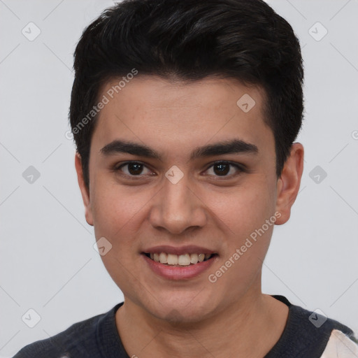 Joyful white young-adult male with short  black hair and brown eyes