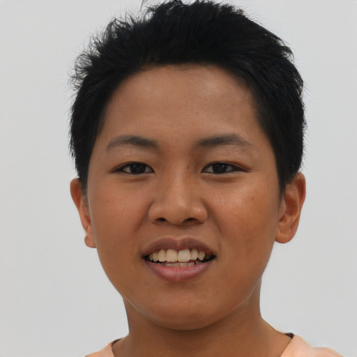 Joyful asian young-adult female with short  black hair and brown eyes