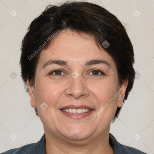 Joyful white adult female with short  brown hair and brown eyes