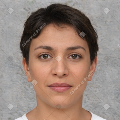 Joyful white young-adult female with short  brown hair and brown eyes