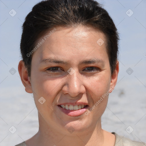 Joyful white adult female with short  brown hair and brown eyes