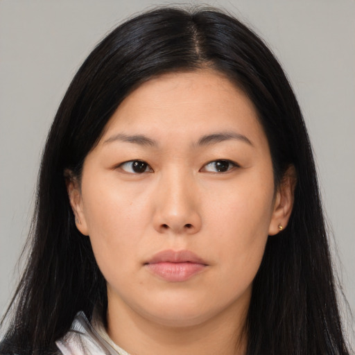 Neutral asian young-adult female with long  brown hair and brown eyes