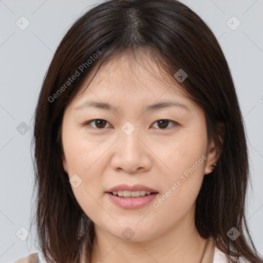 Joyful white young-adult female with medium  brown hair and brown eyes