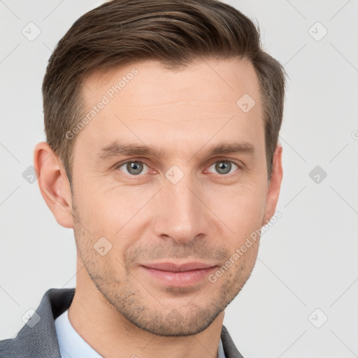 Joyful white young-adult male with short  brown hair and grey eyes