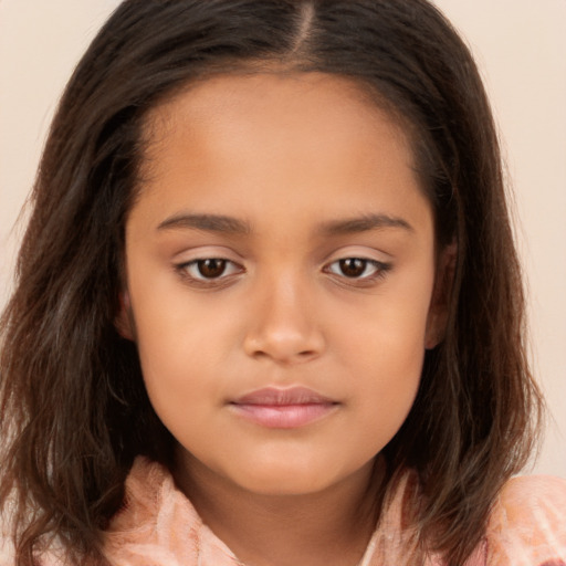 Joyful white child female with long  brown hair and brown eyes