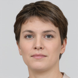 Neutral white young-adult female with short  brown hair and brown eyes