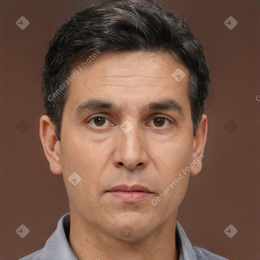 Neutral white adult male with short  brown hair and brown eyes