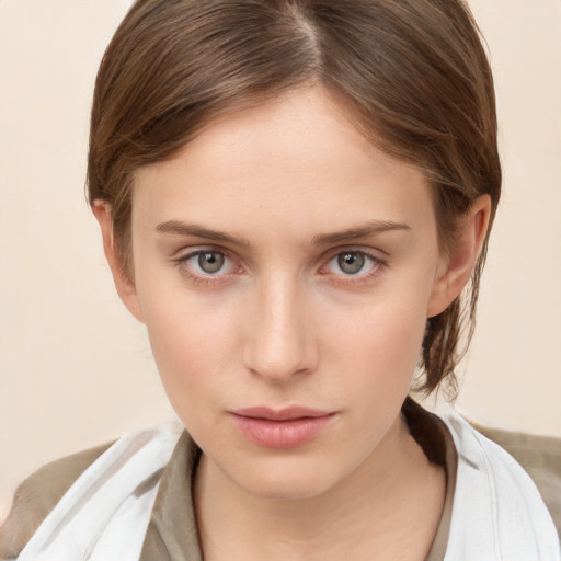 Neutral white young-adult female with medium  brown hair and brown eyes