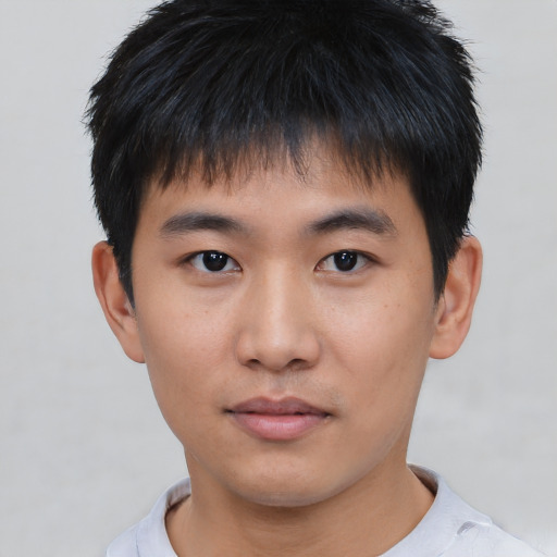Neutral asian young-adult male with short  black hair and brown eyes