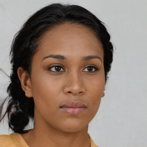 Neutral black young-adult female with medium  black hair and brown eyes