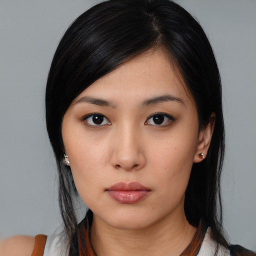 Neutral asian young-adult female with medium  black hair and brown eyes