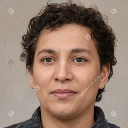 Joyful white adult female with short  brown hair and brown eyes