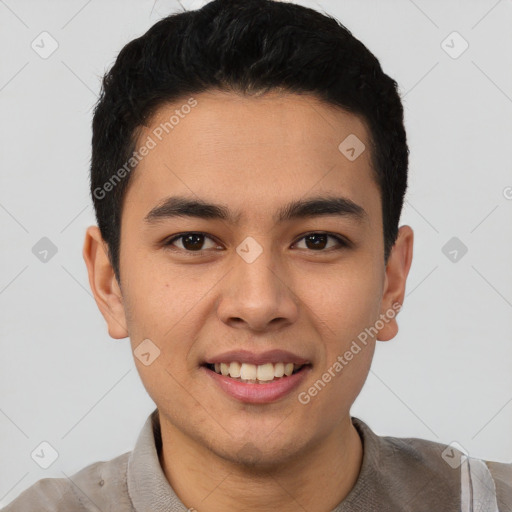 Joyful latino young-adult male with short  black hair and brown eyes