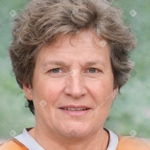Joyful white middle-aged female with short  brown hair and brown eyes