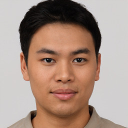 Neutral asian young-adult male with short  brown hair and brown eyes